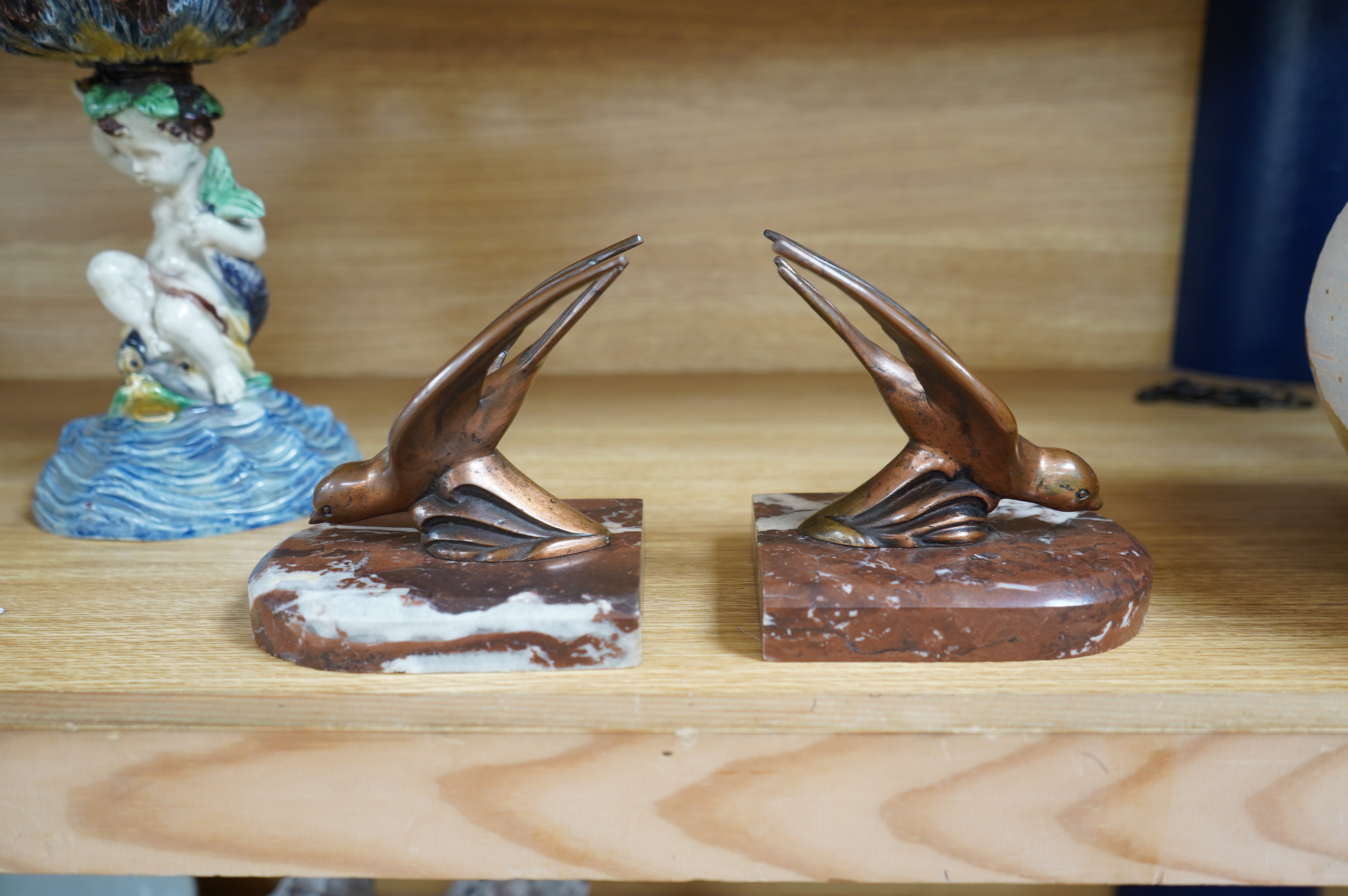 A pair of French Art Deco bronze bird bookends, 12cm. Condition - fair